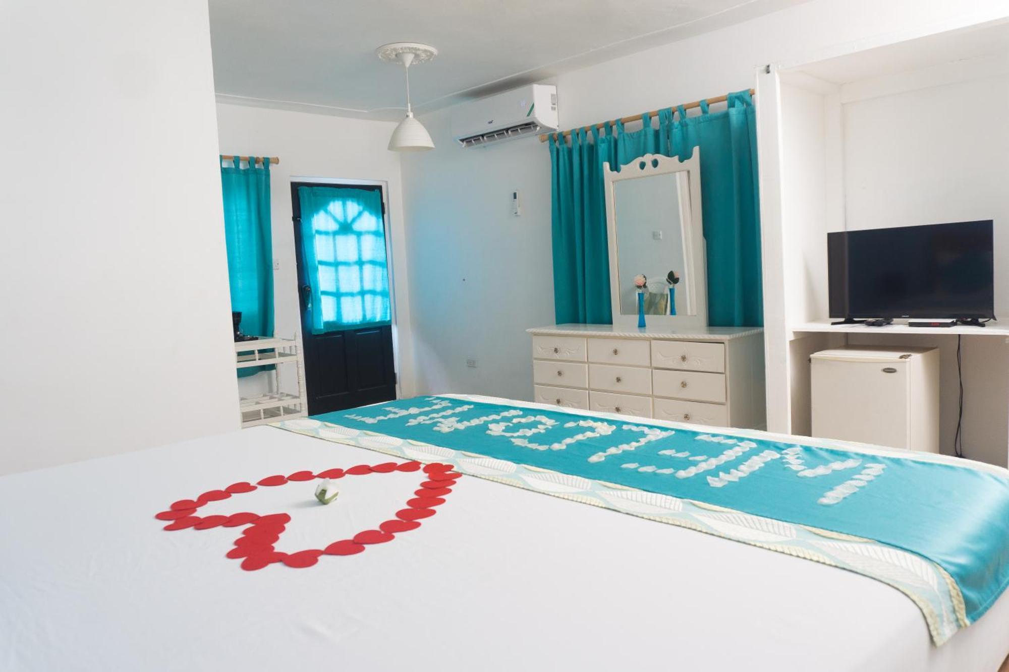 Beyond Sunset Resort & Villas เทรเชอร์ บีช ภายนอก รูปภาพ